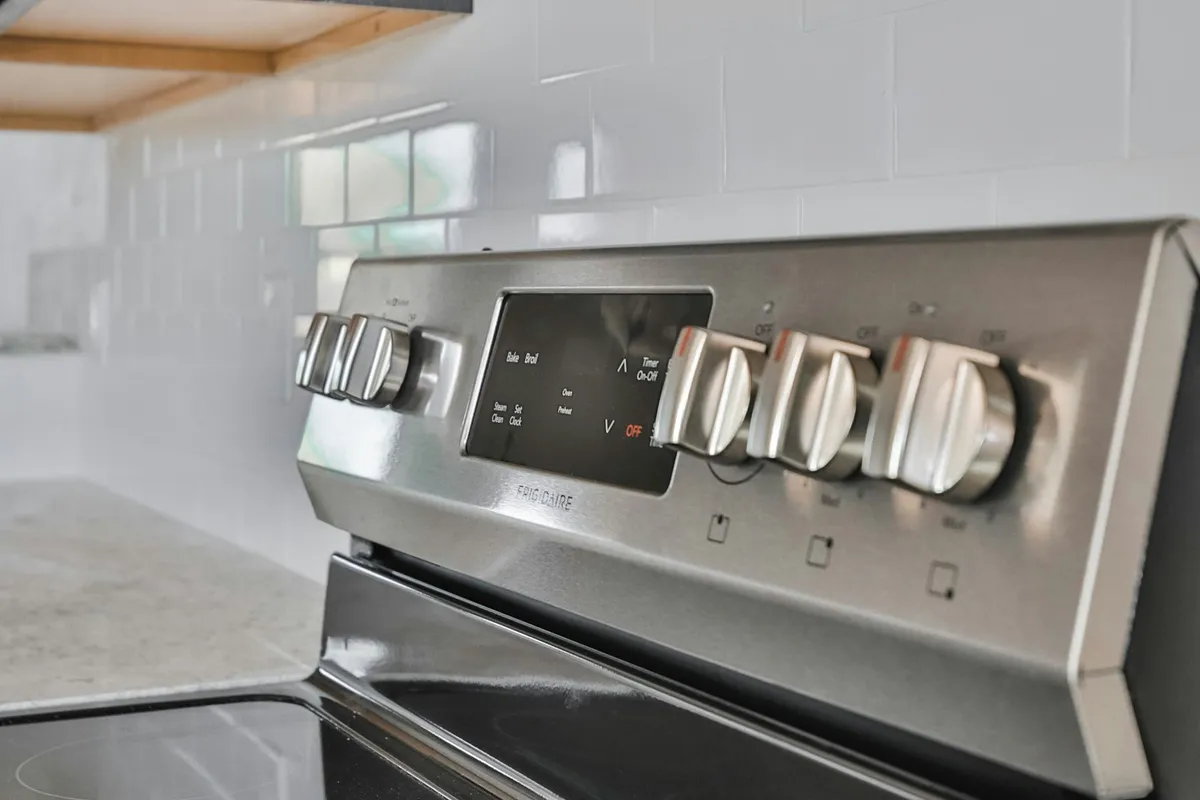 Control knobs on a stainless steel electric range