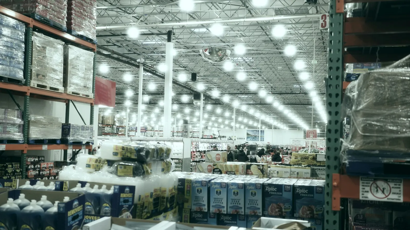Inside a big warehouse store with tall shelves of bulk goods