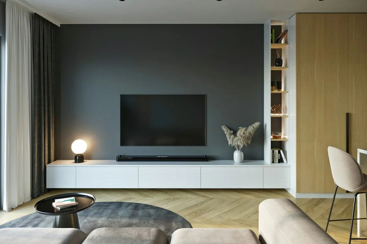 A living room with a couch and a television