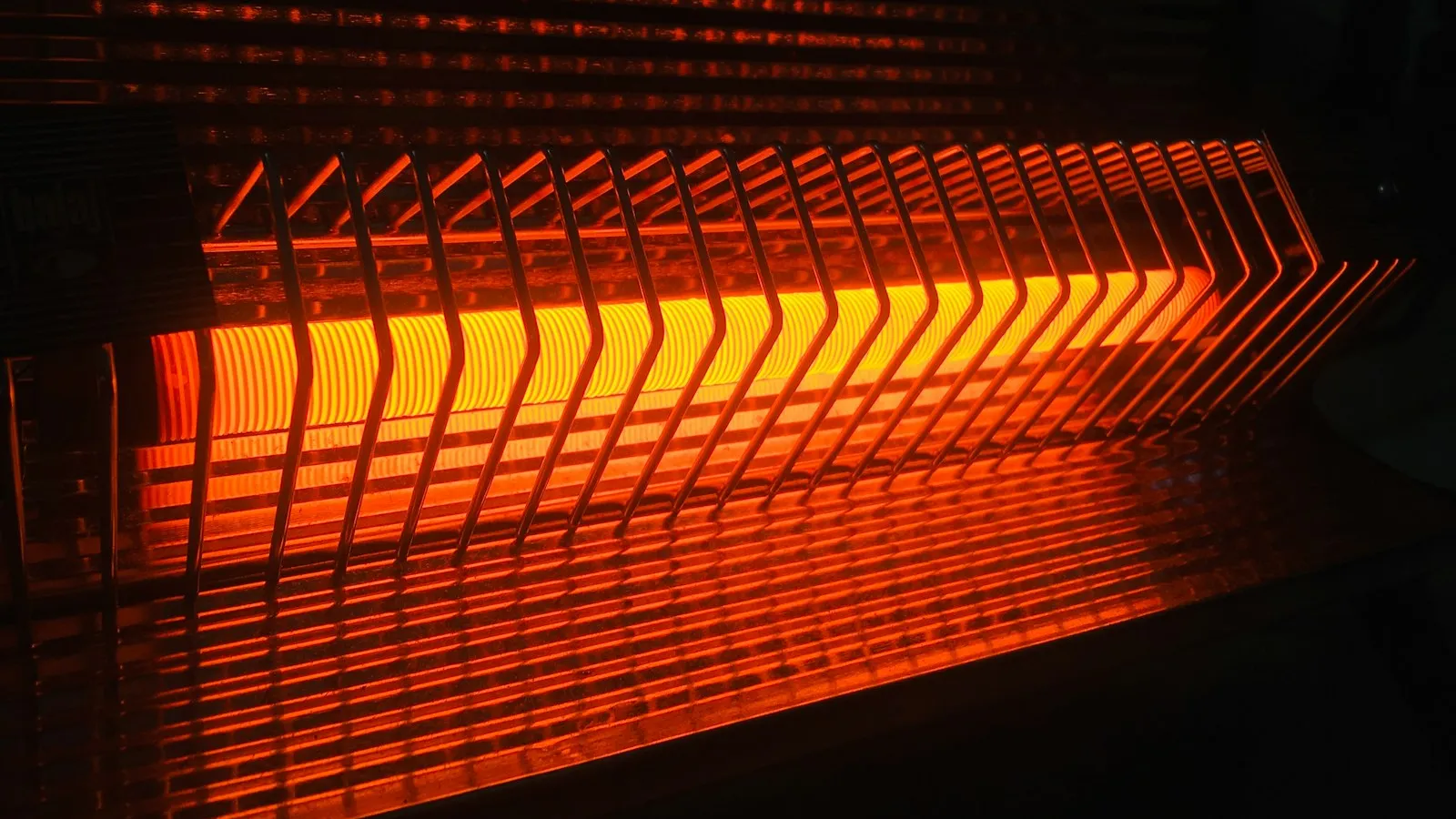Space heater glowing in a dark room