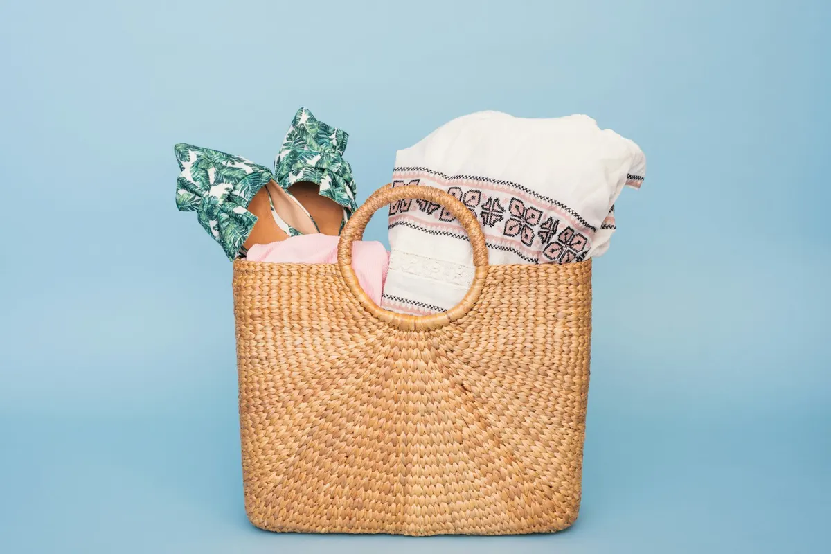 A basket of towels, one of the loads that traps moisture and causes dryer odor